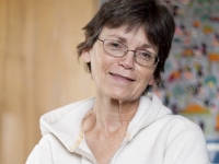 Lisa holding Hermes on bed P2 P2200028